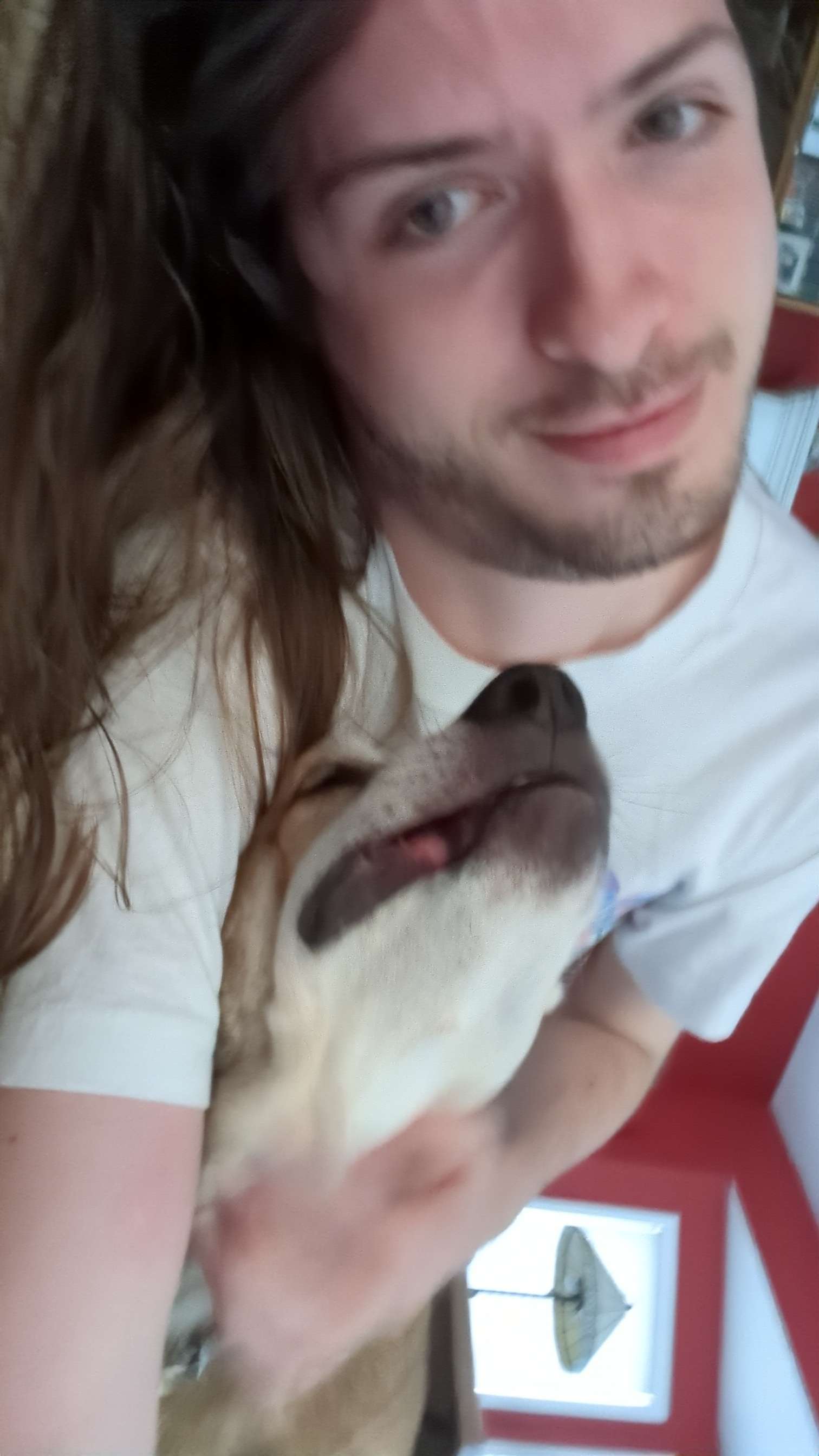 Hans with his adorable dog Heidi, a German Shepherd Mix with fawn and brindle fur. Hans & his dog Heidi